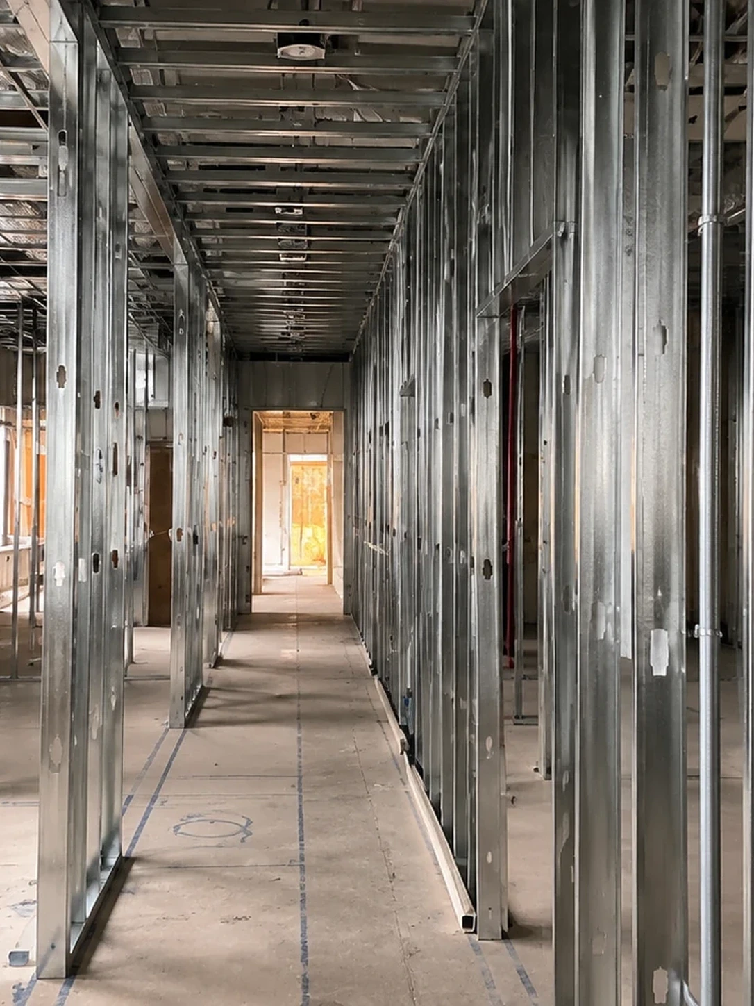 Before — dental office hallway under construction